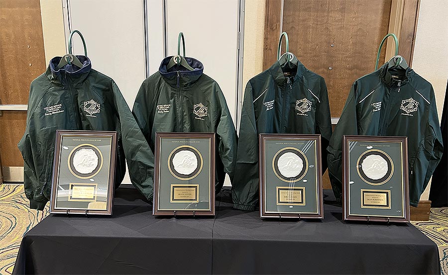 The plaques and jackets presented to each inductee. Photo by Mark Kirk.